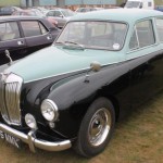 MG Magnette in a fetching two-tone paintjob and slightly dubious polished wheels.