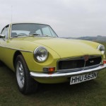 Black plastic grille, Citron Yellow paint, Minilites, V8 engine. The perfect MGB.